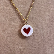 Load image into Gallery viewer, Hand painted red heart ceramic pendant on a gold chain - Let's Jam, Camden Market London