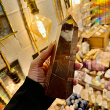 Load image into Gallery viewer, Polished red jasper crystal tower held in the hand - Let's Jam, Camden Market