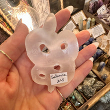 Load image into Gallery viewer, Carved selenite snake and stand photographed on display in the shop - Let's Jam, Camden Market