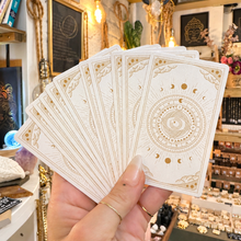 Load image into Gallery viewer, Fan of Tarot Learning Deck card backs with their gold sun design - Let's Jam, Camden Market, London