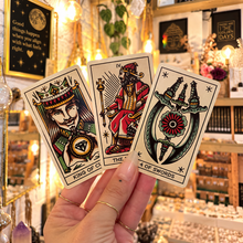 Load image into Gallery viewer, Three Tattoo Tarot court cards held in the hand - Let's Jam, Camden Market