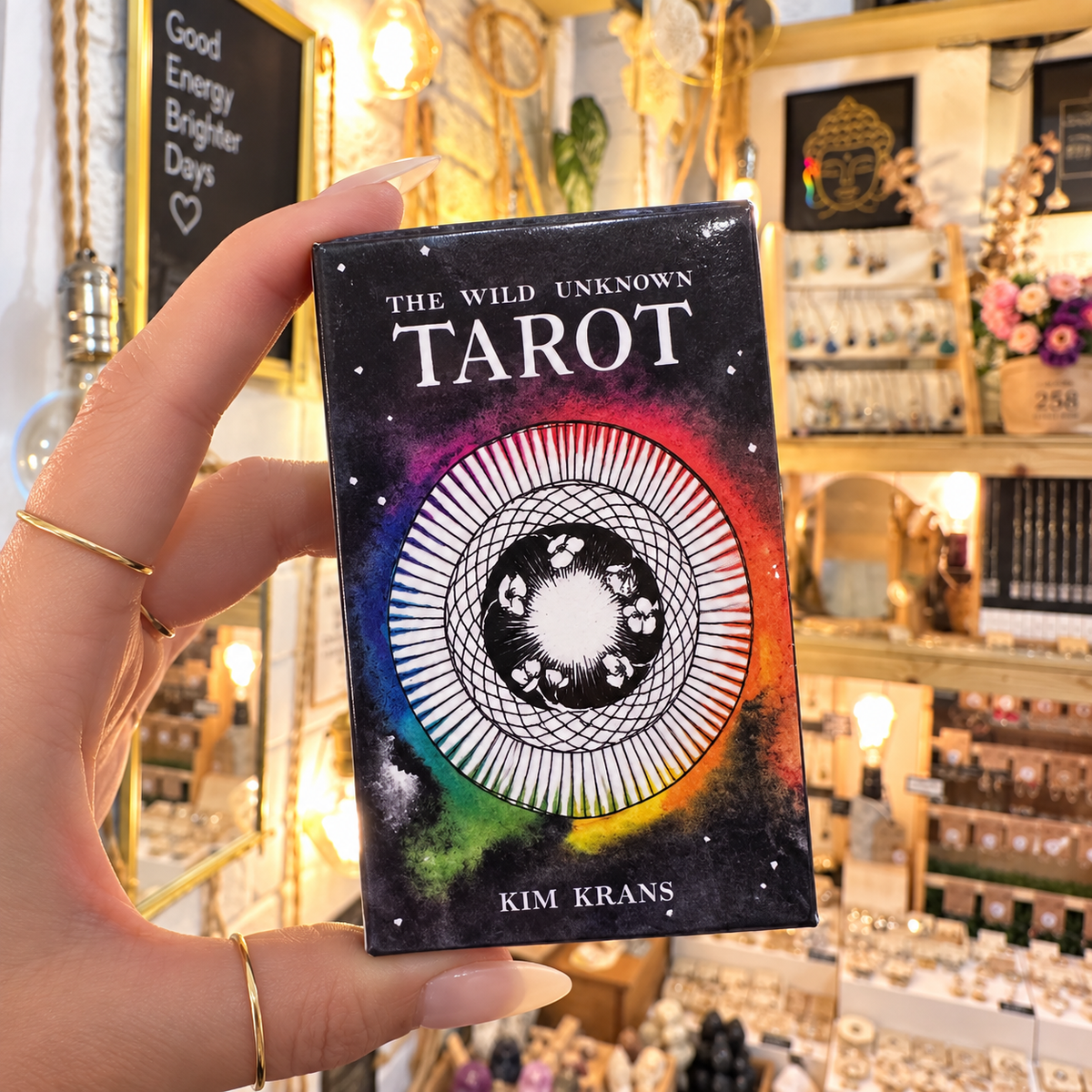 The Wild Unknown Tarot by Kim Krans deck box held in the shop - Let's Jam, Camden Town London