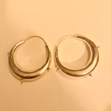 Load image into Gallery viewer, Chunky brass loop hoop earrings with a sleek, sculptural design, photographed on a plain light background - Let's Jam jewellery collection