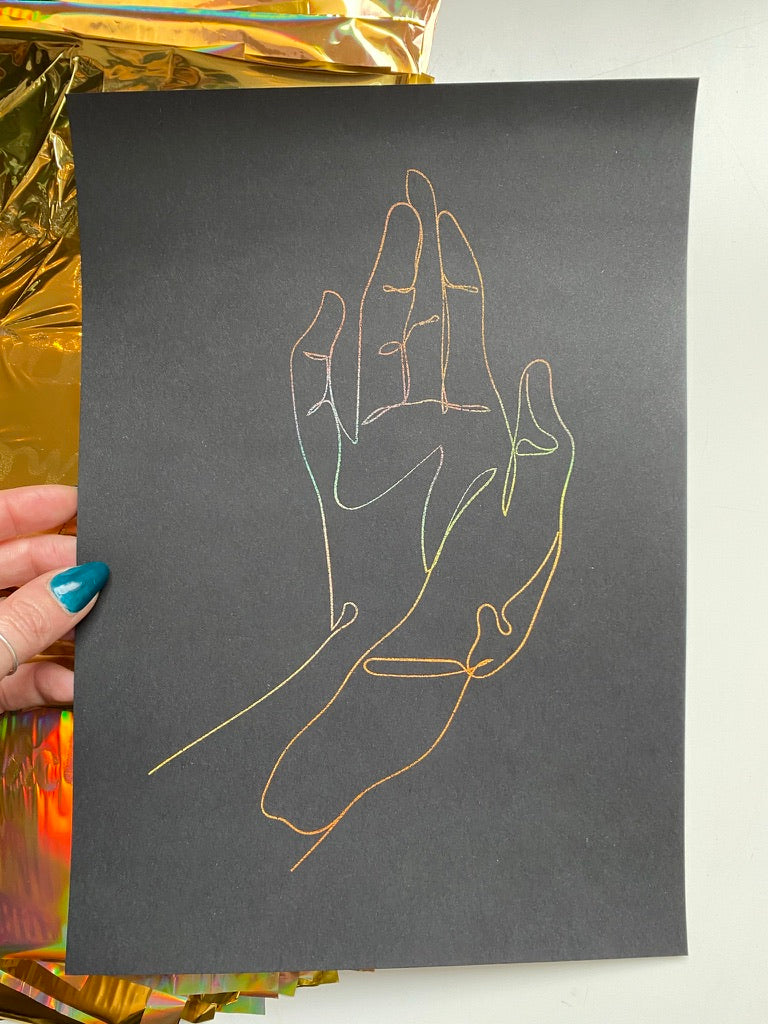 One-line print of a raised hand in a mudra gesture, rainbow foil on black - Let's Jam art prints, Camden Market