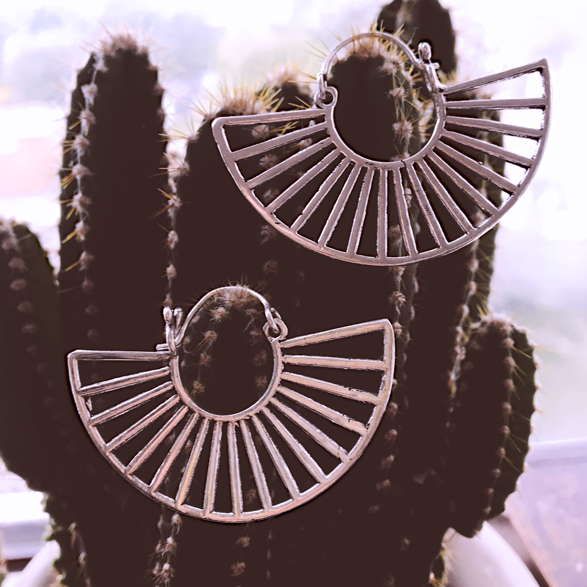 Close-up of the spoke detail inside an open fan hoop earring - Let's Jam, Camden Market