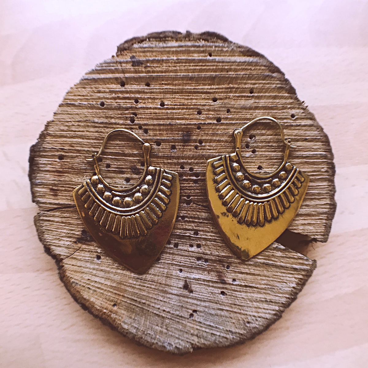 Close-up of the fan drop hanging from a patterned hoop earring - Let's Jam, Camden Market