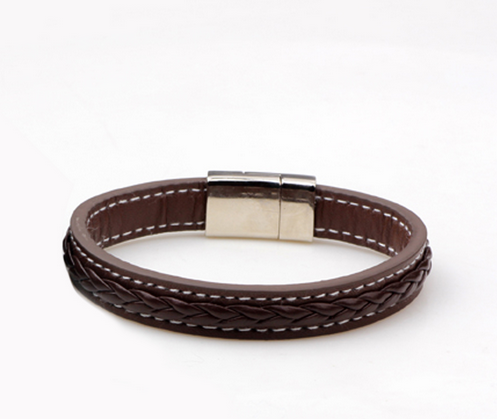 Side view of a brown braided leather bracelet and its polished silver clasp - Let's Jam, Camden Town London