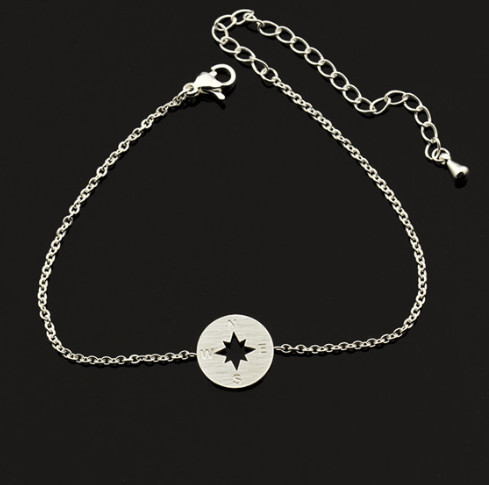 Three compass bracelets in gold, silver and rose gold shown together - Let's Jam jewellery, Camden Town London