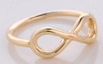 Infinity rings in gold, silver and rose gold, stackable with other Let's Jam rings - Camden Market, London