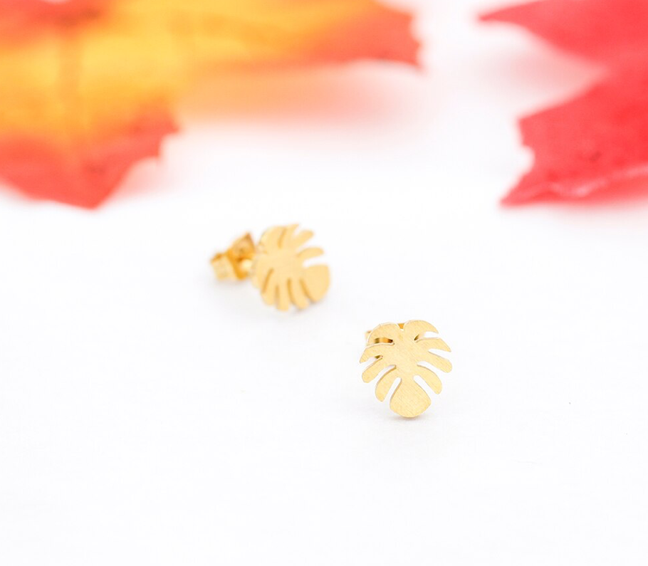 Leaf shaped stud earrings resting on a green succulent - Let's Jam, Camden Town London
