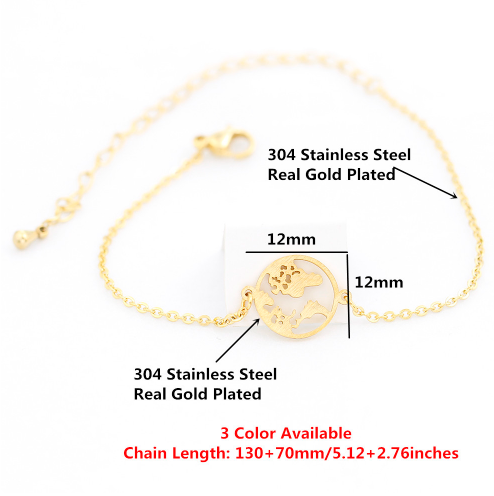 Globe charm bracelet held in hand to show the engraved continents - Let's Jam, Camden Town