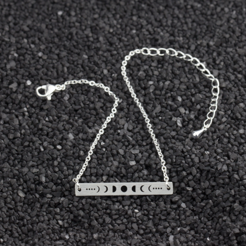 Moon phases bracelet fastened on the wrist - Let's Jam jewellery, Camden Market, London