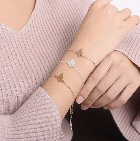 Gold dove charm bracelet on a slim chain - Let's Jam, Camden Town