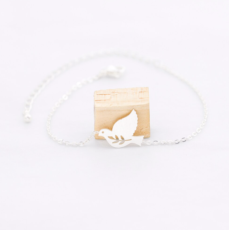 Rose gold dove charm bracelet with a fine link chain - Let's Jam, Camden Market London