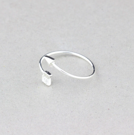 Minimal arrow ring from the Let's Jam minimalist rings collection - Camden Market, London