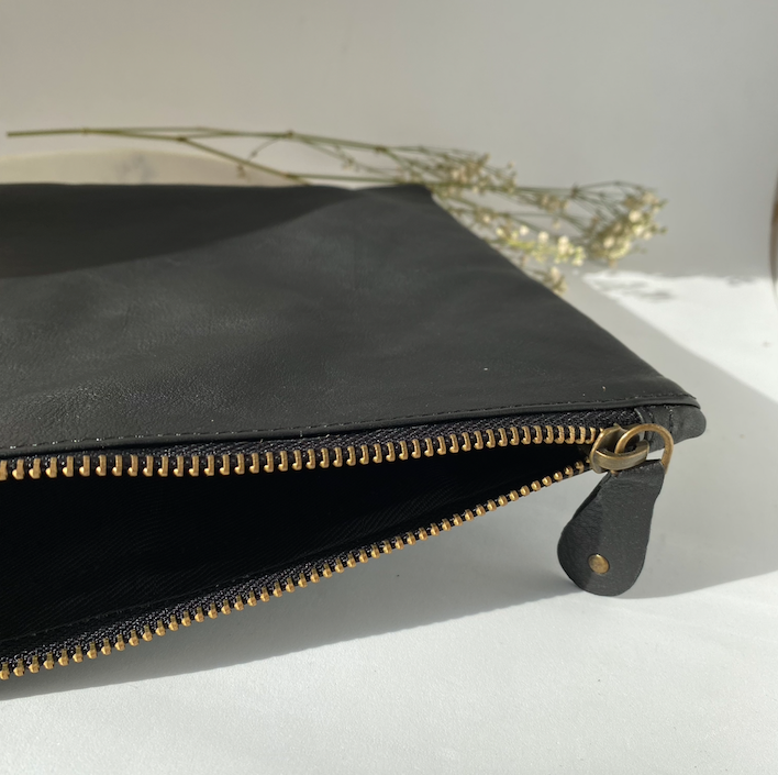 Inside of the leather clutch opened to reveal the lined pocket - Let's Jam accessories, Camden Town London