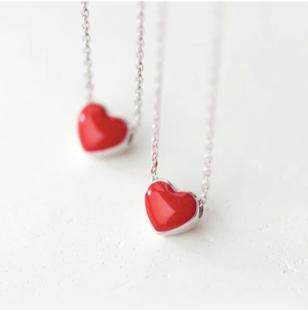 925 sterling silver necklaces with glossy red enamel heart pendants at two different chain lengths, on a pale background - Let's Jam jewellery collection