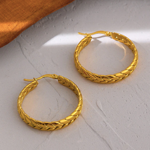 Load image into Gallery viewer, Pair of heavy gold-tone hoops laid flat on a pale surface - Let's Jam, Camden Town London