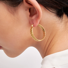 Load image into Gallery viewer, Close-up of the smooth rounded gold hoop against the lobe - Let's Jam jewellery, Camden Town London