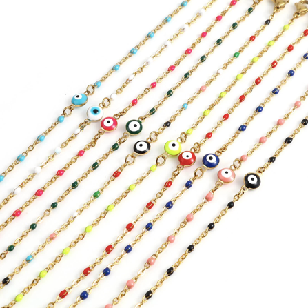 Gold chain bracelet with a bright enamel evil eye bead - Let's Jam, Camden Market