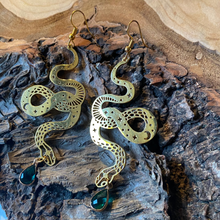 Load image into Gallery viewer, Serpent drop earrings with the green stone catching the light - Let's Jam, Camden Market London