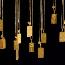Load image into Gallery viewer, Gold-plated zodiac pendant necklace showing the engraved horoscope symbol side - Let's Jam jewellery, Camden Market