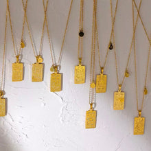 Load image into Gallery viewer, Reverse of a zodiac necklace pendant with the star constellation engraved in gold - Let's Jam, Camden Town