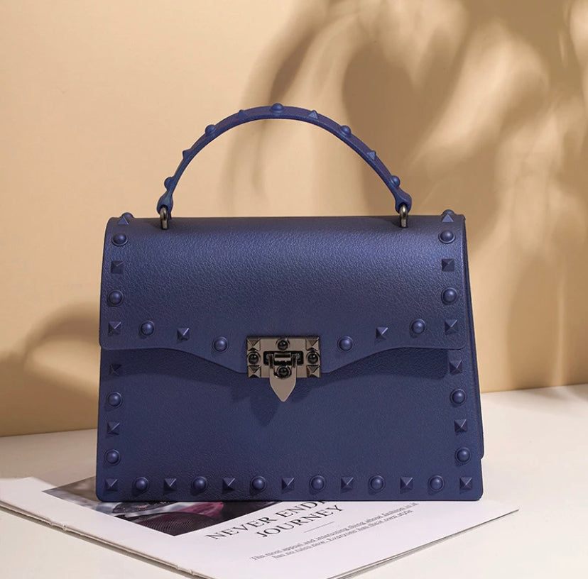 Nude handbag shown at an angle to reveal its structured shape - Let's Jam accessories, Camden Market