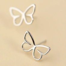Load image into Gallery viewer, 925 sterling silver hollow wire outline butterfly stud earrings on a beige background - Let's Jam jewellery collection