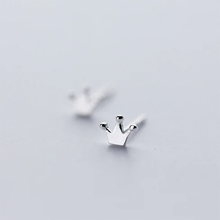 Load image into Gallery viewer, 925 sterling silver tiny crown stud earrings, close-up shot of the crown design on a soft white background - Let's Jam jewellery collection