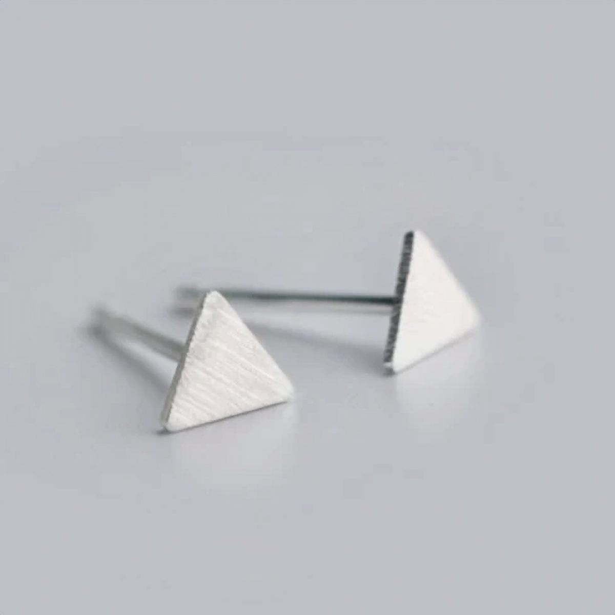 Geometric 925 sterling silver studs photographed from above - Let's Jam, Camden Market, London