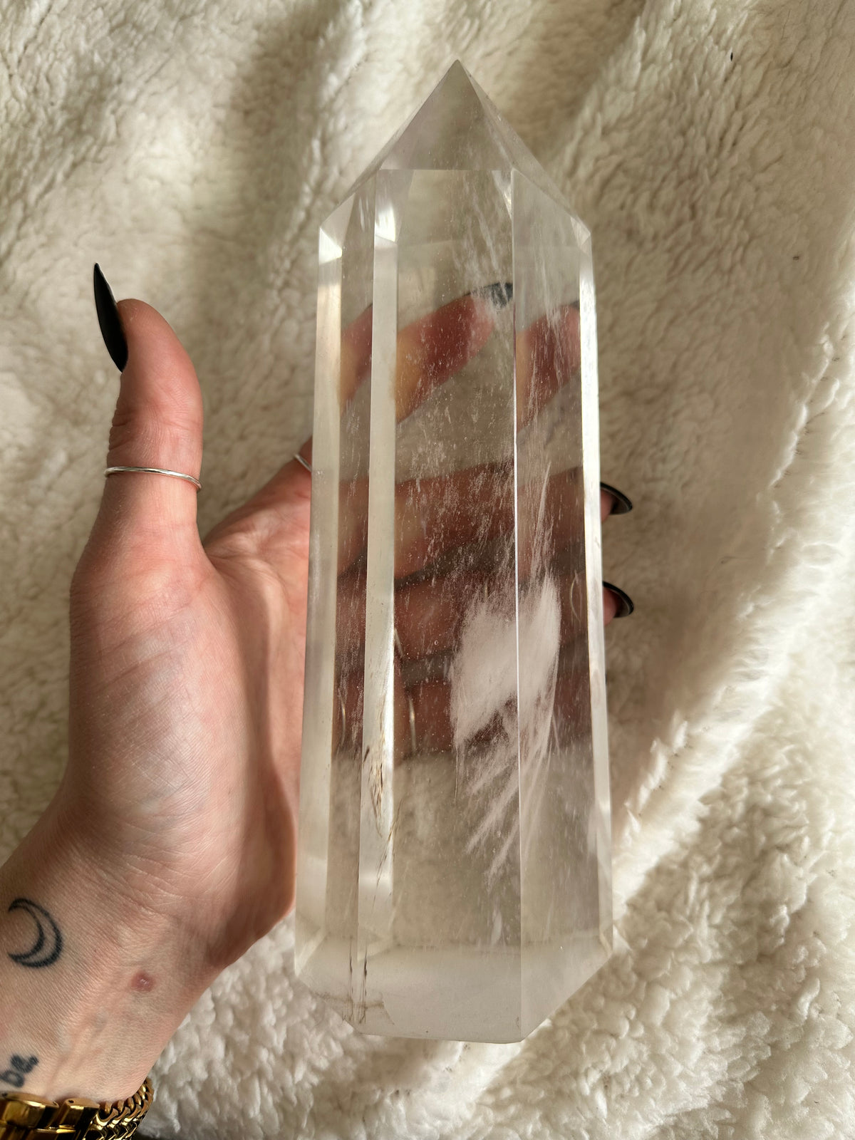 Quartz tower backlit by a sunny window with houseplants nearby - Let's Jam crystals, Camden Market London