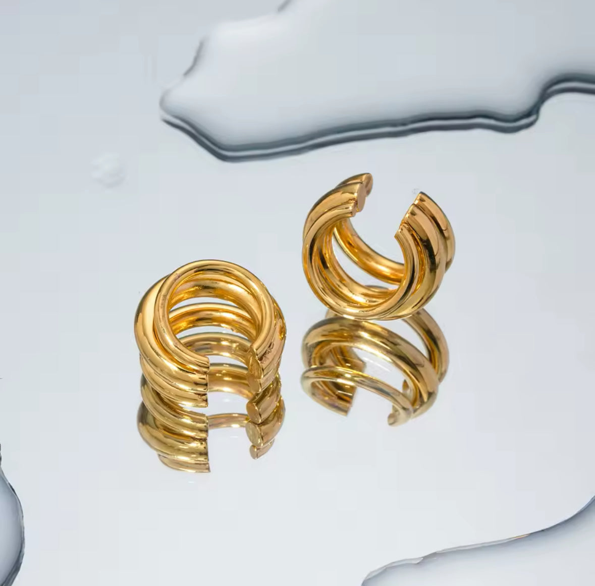 Three-layer cuff paired with a small hoop earring on the lobe - Let's Jam, Camden Market London