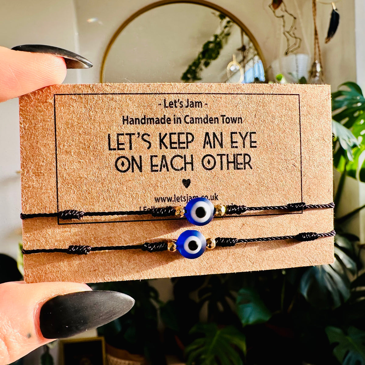 Two friends wearing the matching evil eye bracelets - Let's Jam, Camden Town London