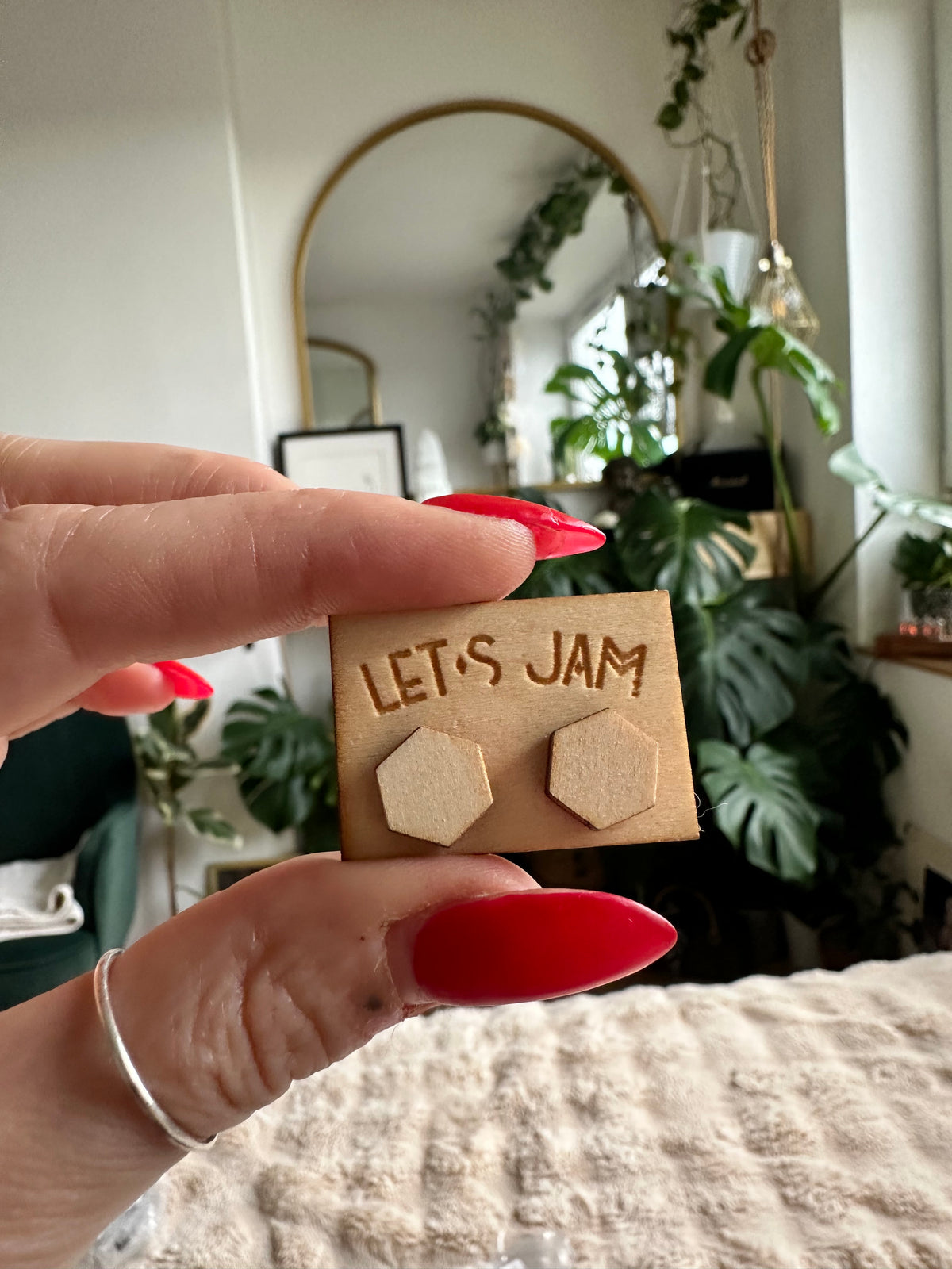 Hexagon-shaped wooden stud earrings with clean geometric edges - Let's Jam jewellery, Camden Town