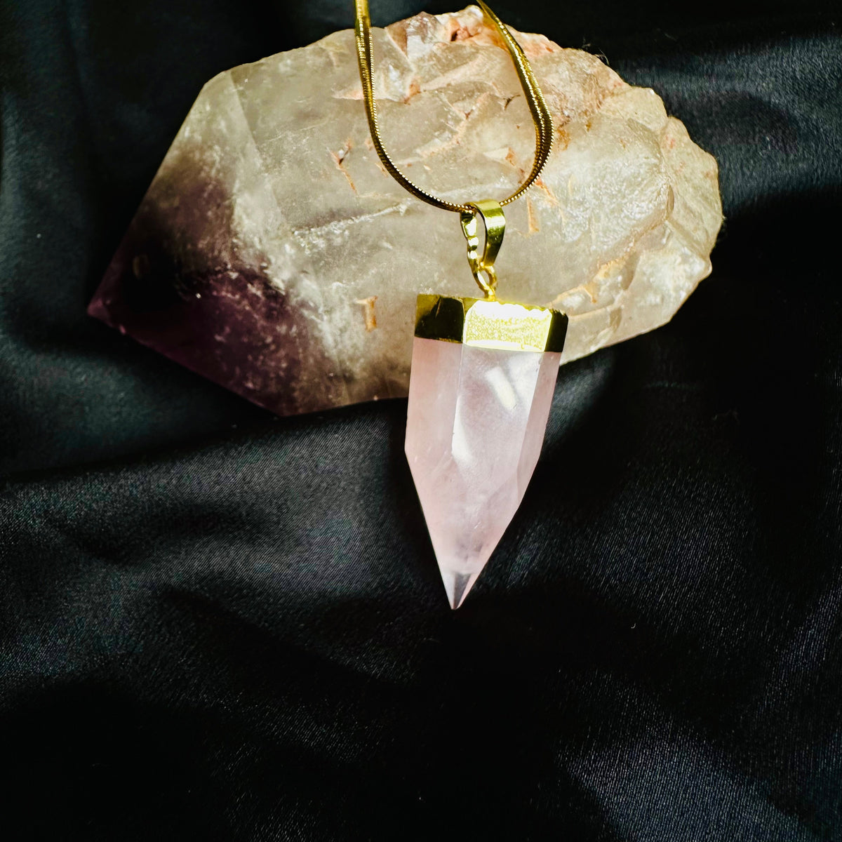 Pale pink rose quartz point pendant capped in gold on a snake chain - Let's Jam jewellery, Camden Market