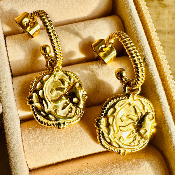 18k gold-plated moon and sun charm hoop earrings on hypoallergenic stainless steel, reversible design displayed in a jewellery box - Let's Jam jewellery collection