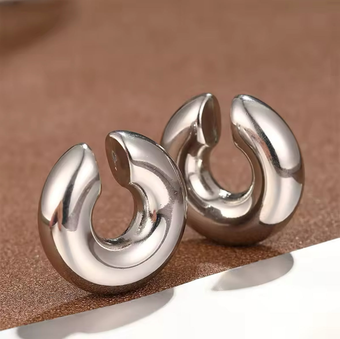 Detail of the 30mm hoop earring next to its matching ear cuff - Let's Jam jewellery, Camden Town London
