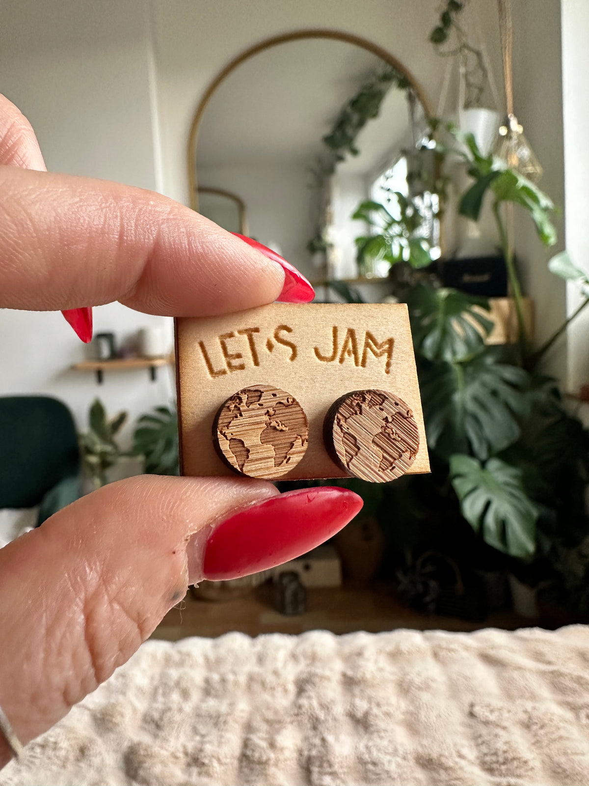 Round wooden stud earrings engraved with a world map design - Let's Jam, Camden Market