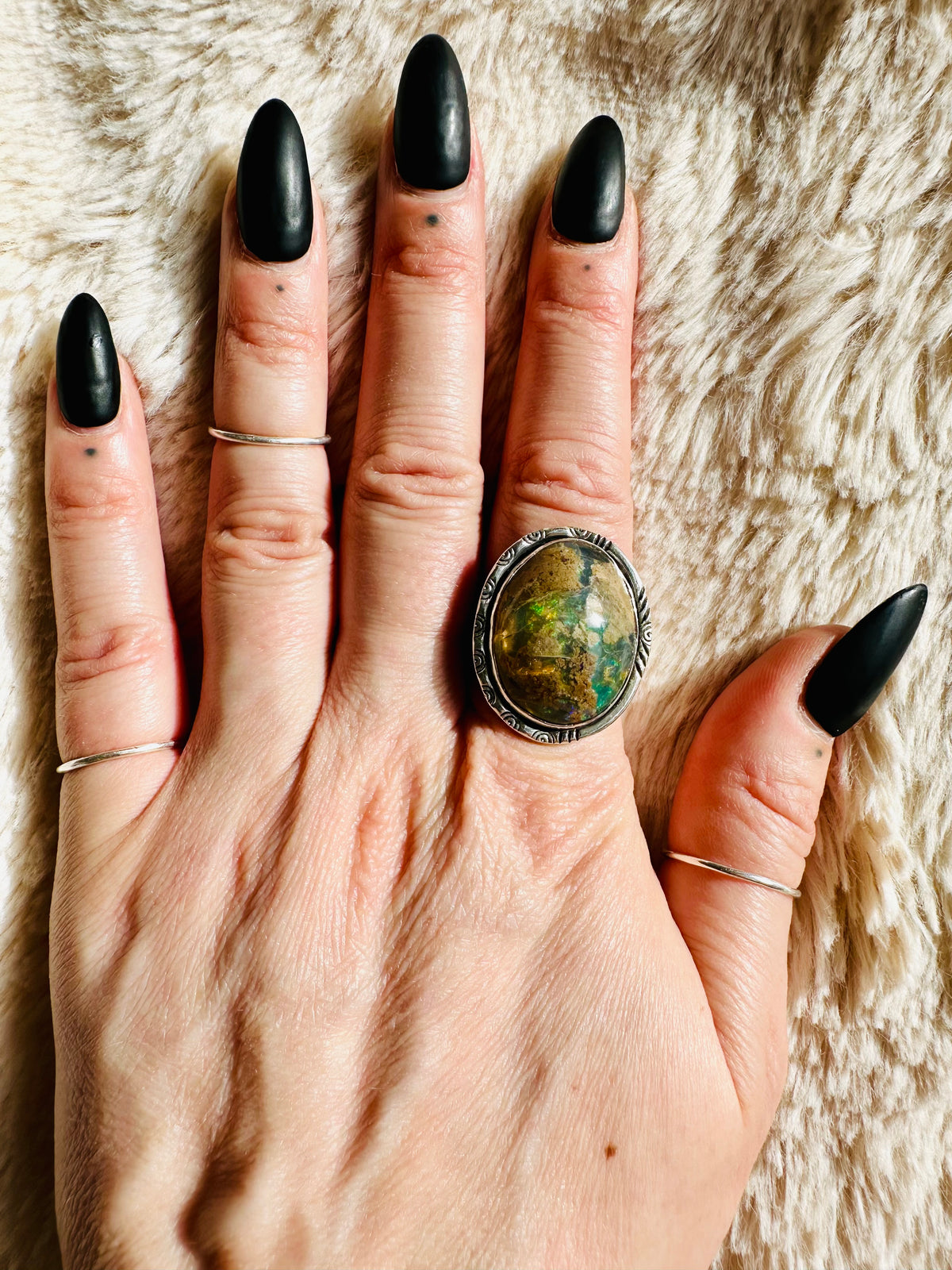 Round natural opal cabochon showing green, blue and gold play of colour - Let's Jam handmade jewellery, Camden Market