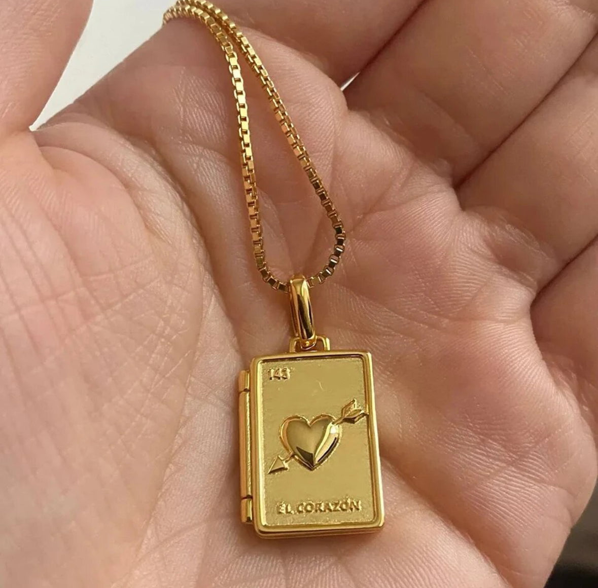 Heart-shaped locket opened to show the space for a photo inside - Let's Jam, Camden Town