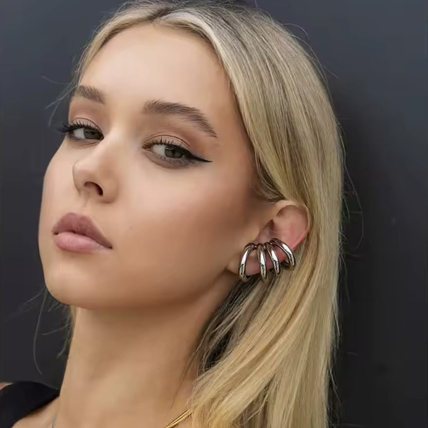 Model wearing a silver 4-layer multi-loop ear cuff, no piercing needed - Let's Jam jewellery collection