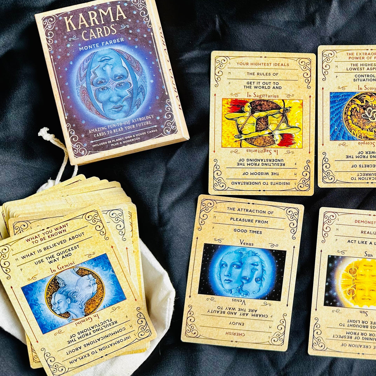 Close view of a Karma Card and its colourful astrological artwork - Let's Jam tarot and oracle, Camden Market London