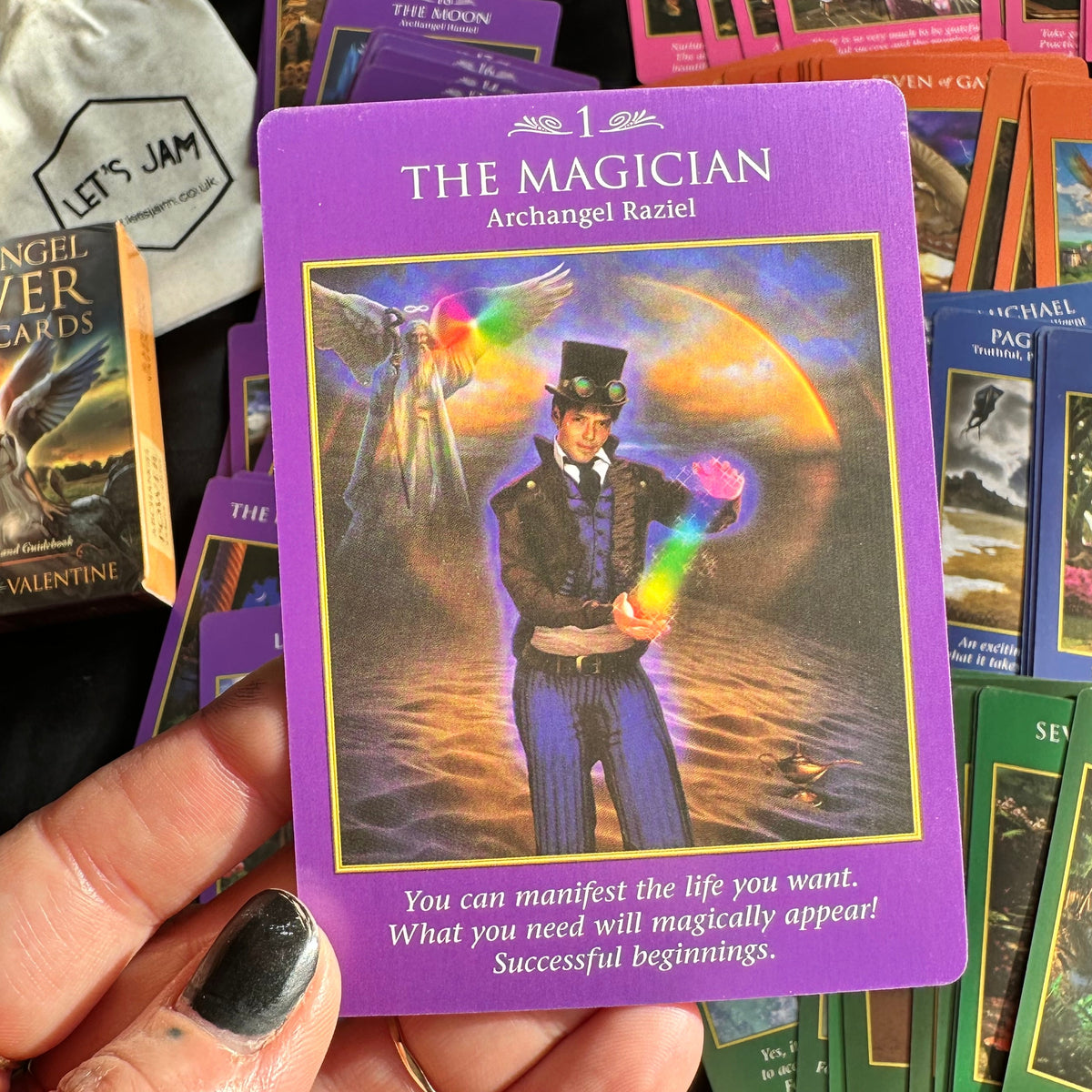 Close view of an Archangel Power tarot card and its illustration - Let's Jam, Camden Town