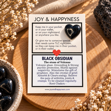 Load image into Gallery viewer, Black obsidian tiny heart crystal, glossy volcanic stone, on its card - Let's Jam, Camden Town London
