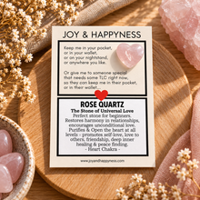 Load image into Gallery viewer, Pale pink rose quartz tiny heart crystal on its Joy &amp; Happyness card - Let's Jam, Camden Market, London

