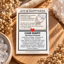 Load image into Gallery viewer, Clear quartz tiny heart crystal on a wooden board with dried flowers - Let's Jam, Camden Market London
