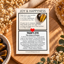Load image into Gallery viewer, Tiger's eye tiny heart crystal with golden brown banding on its card - Let's Jam, Camden Town, London
