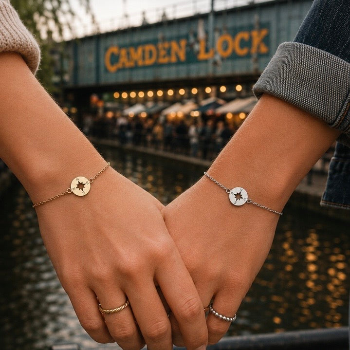 Two people holding hands wearing gold and silver star charm matching bracelets by Camden Lock - Let's Jam, Camden Market, London