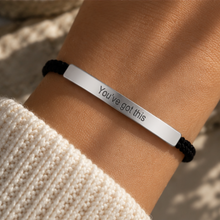 Load image into Gallery viewer, Silver You've Got This bar on a black cord bracelet, worn on the wrist - Let's Jam, Camden Market
